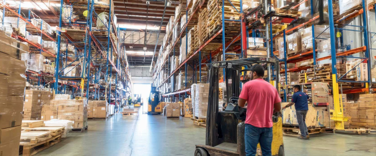 warehouse with boxes and fork lift